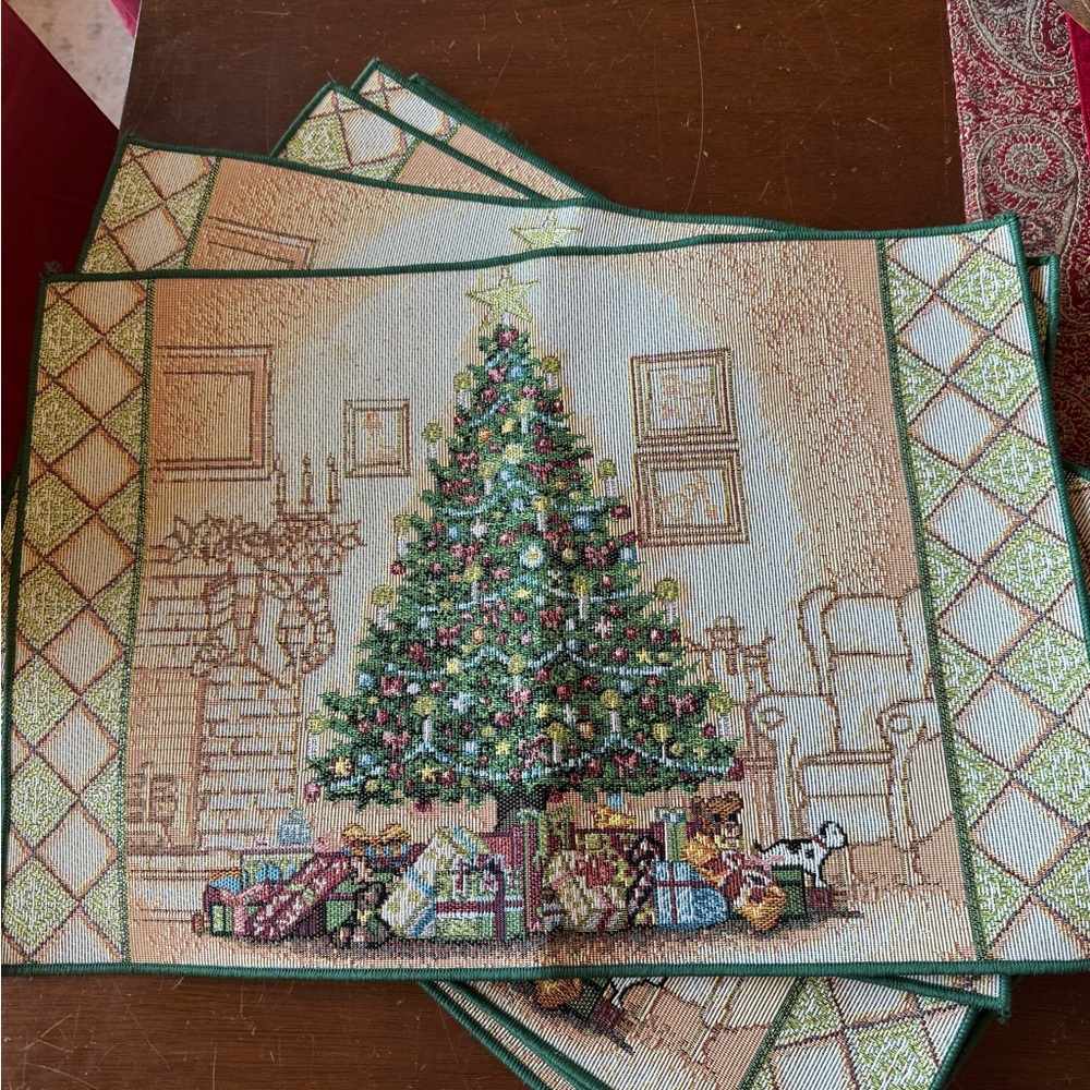 Like-new needlepoint Christmas placemats.